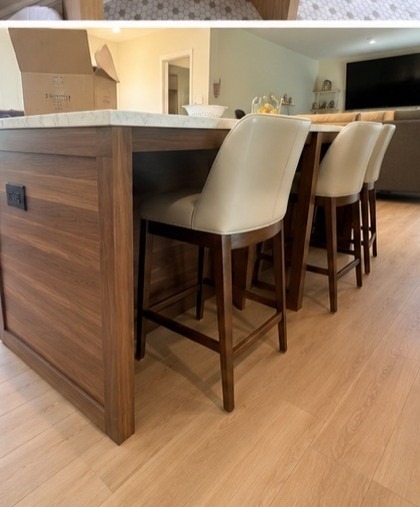 Walnut kitchen island with bar stools