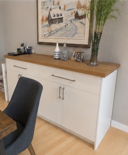 White sideboard with wood countertop