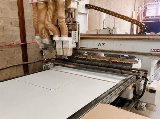 CNC machine close-up in cabinet workshop